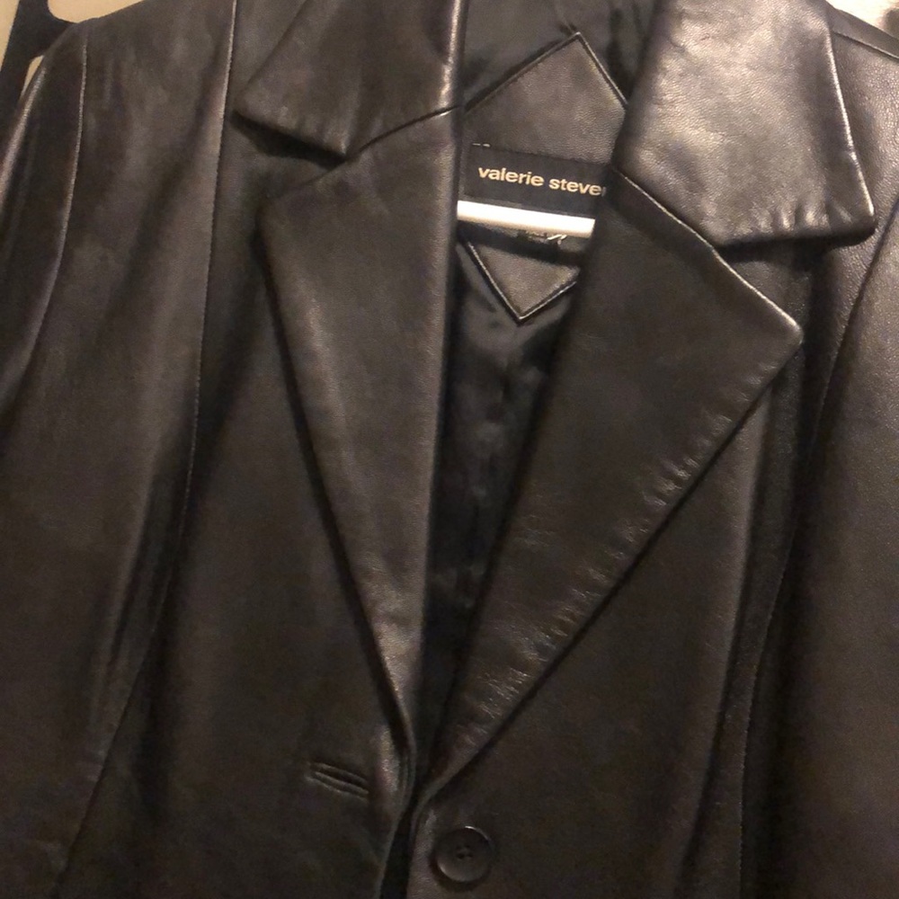 Barely worn women’s black leather jacket small